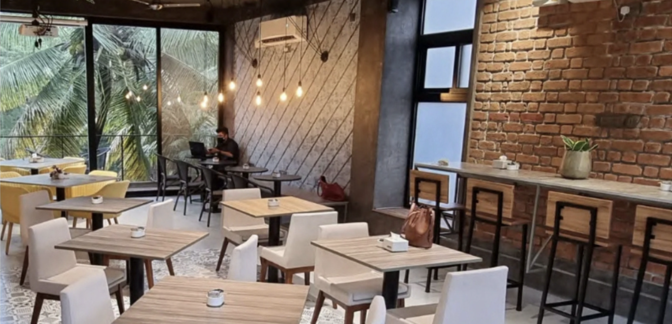 Cafe interior with wood ceiling and patterned seating